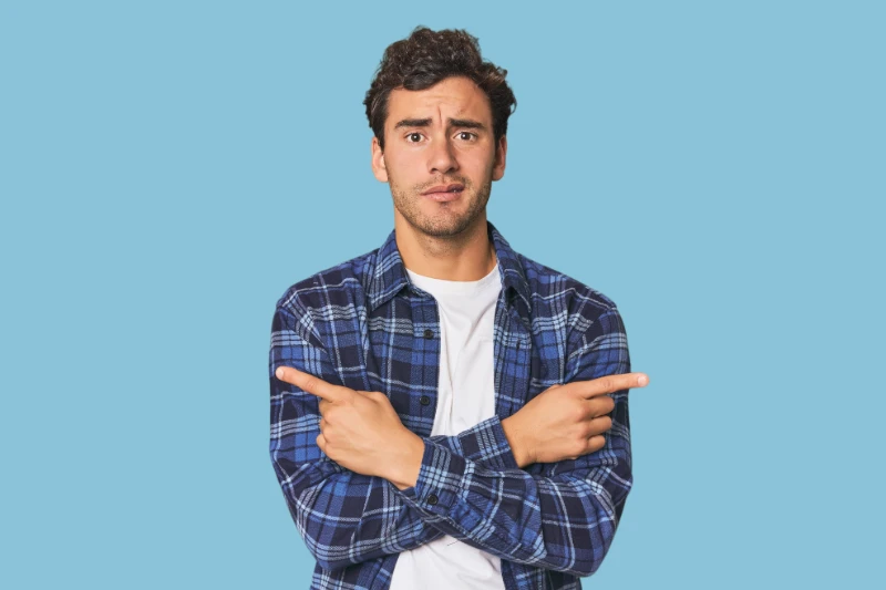 Man pointing to either side